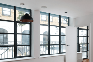 black aluminium window interior in a white room